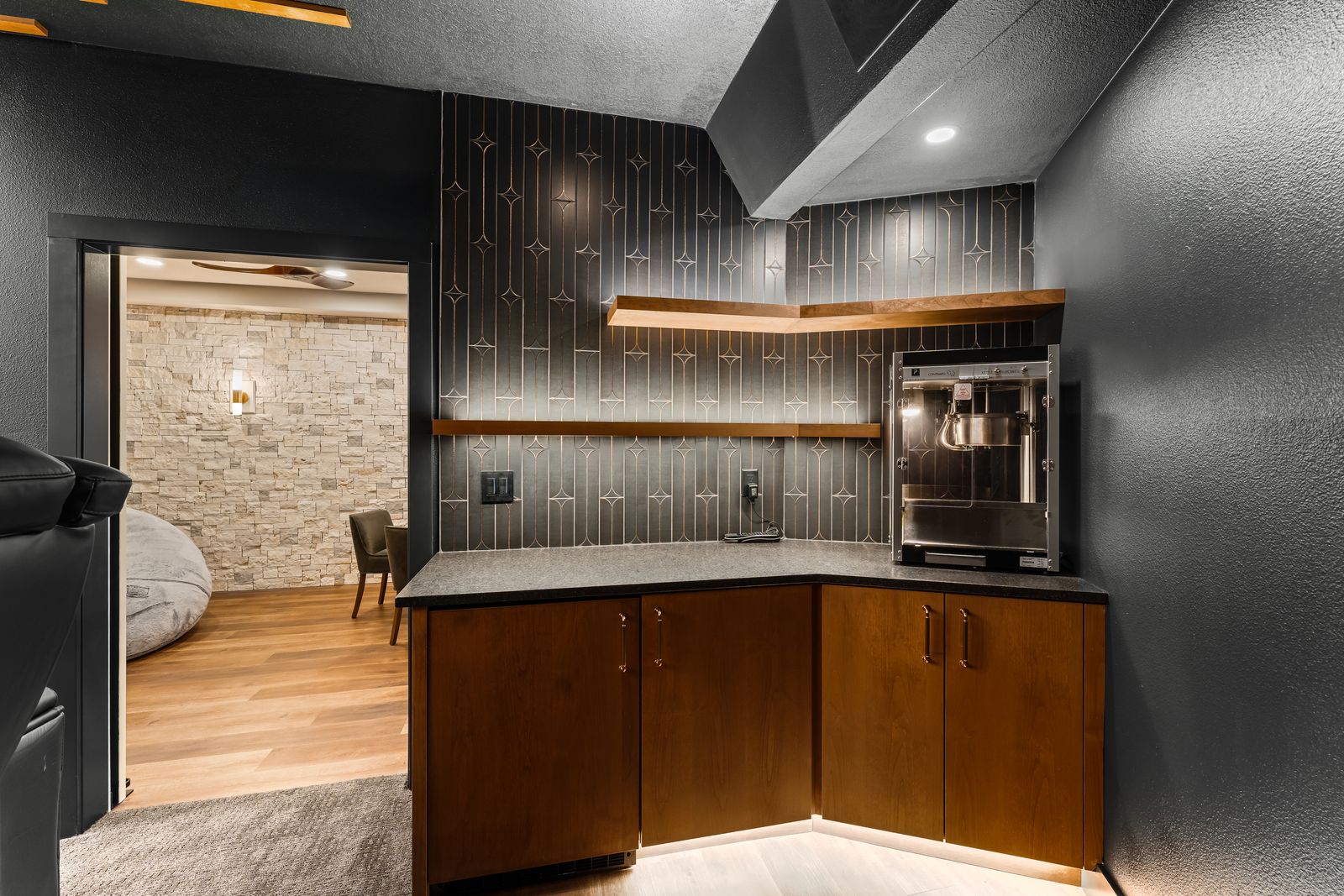 Wet bar with undershelf lighting installed by residential electrician
